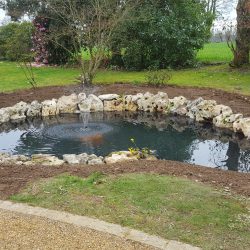 réalisation aménagement abords bassin enrochements