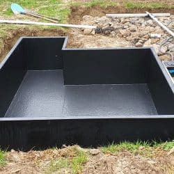 Mise en place d'un bassin de jardin sur mesure